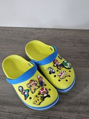 CROCS Kids Citron Yellow and Blue Clogs with Super Mario Charms C 13 Boy